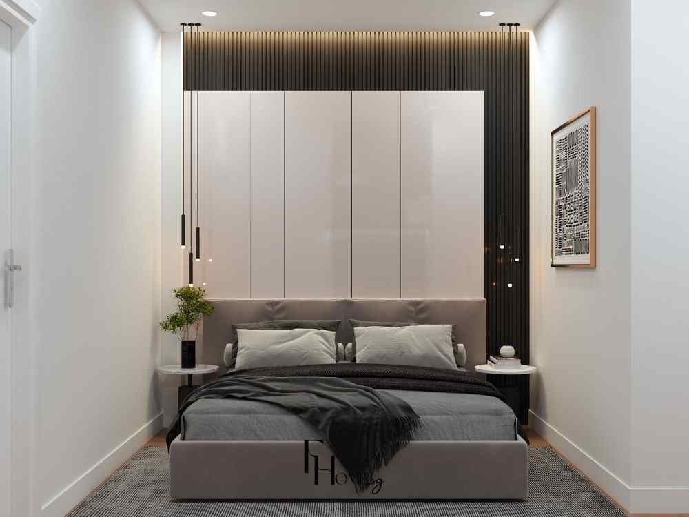 Phòng ngủ hiện đại với tông xám trung tính, tủ cao kịch trần và đèn thả tối giản tinh tế