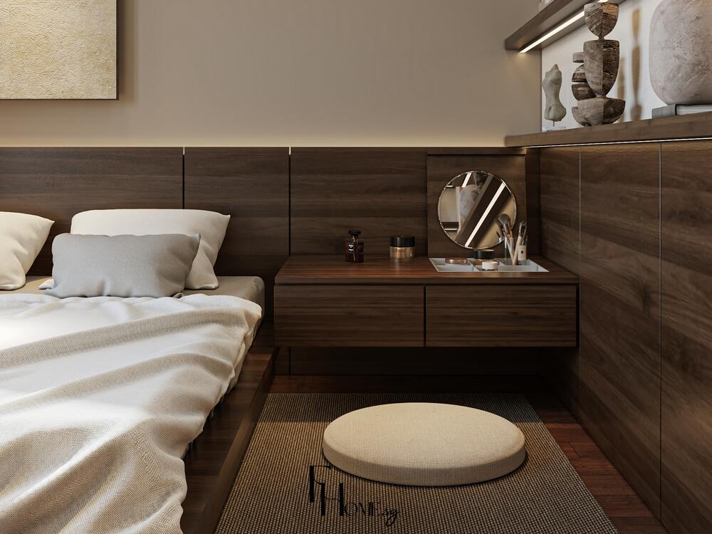 Phòng ngủ phong cách Nhật Bản với giường futon cạnh bàn thấp gỗ nâu và đèn hắt sáng ấm