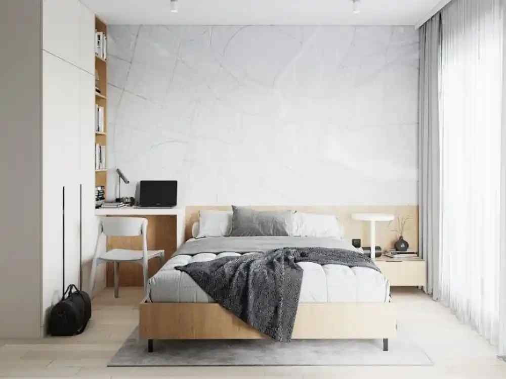 Phòng ngủ phong cách Scandinavian với tông màu trắng và gỗ sáng, bàn làm việc nhỏ gọn bên cửa sổ