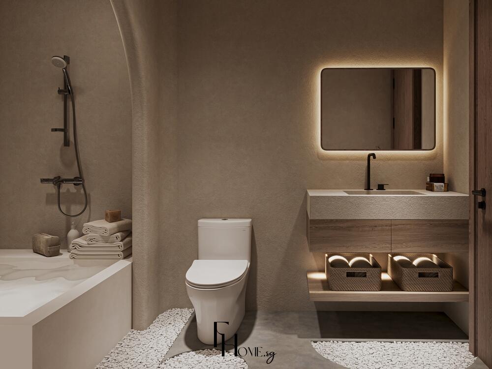 Phòng tắm phong cách Nhật Bản với bồn tắm nằm cạnh tường cong, bề mặt đá cuội trang trí sàn