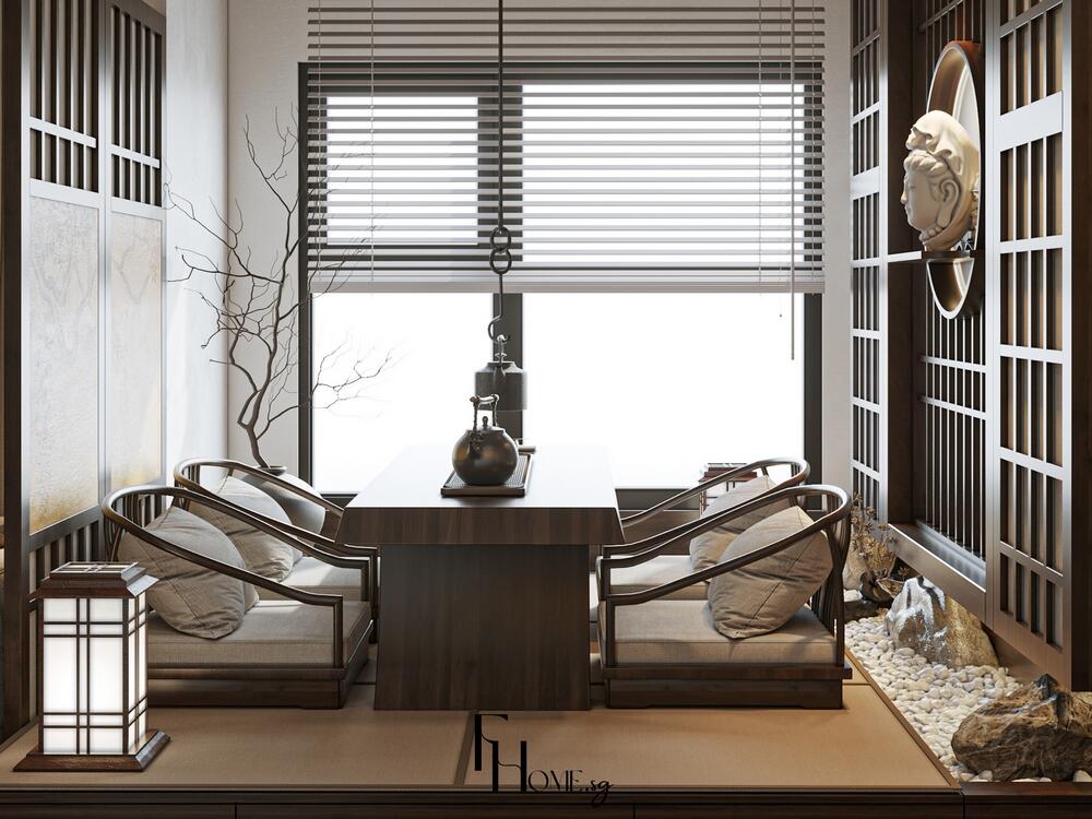 Phòng trà phong cách Nhật Bản với bàn thấp, ghế tựa gỗ cong và sỏi đá trang trí cạnh tường