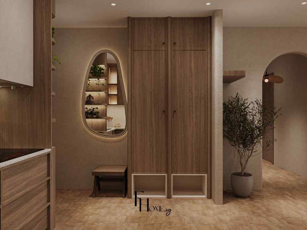 Sảnh nhà với tủ gỗ cao, gương dáng bo viền ánh sáng hắt và cây xanh trang trí