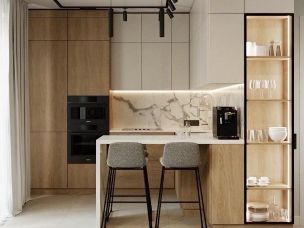 Quầy bar đóng vai trò phân chia không gian tự nhiên, mang đến vẻ hiện đại và thoáng mở cho ngôi nhà