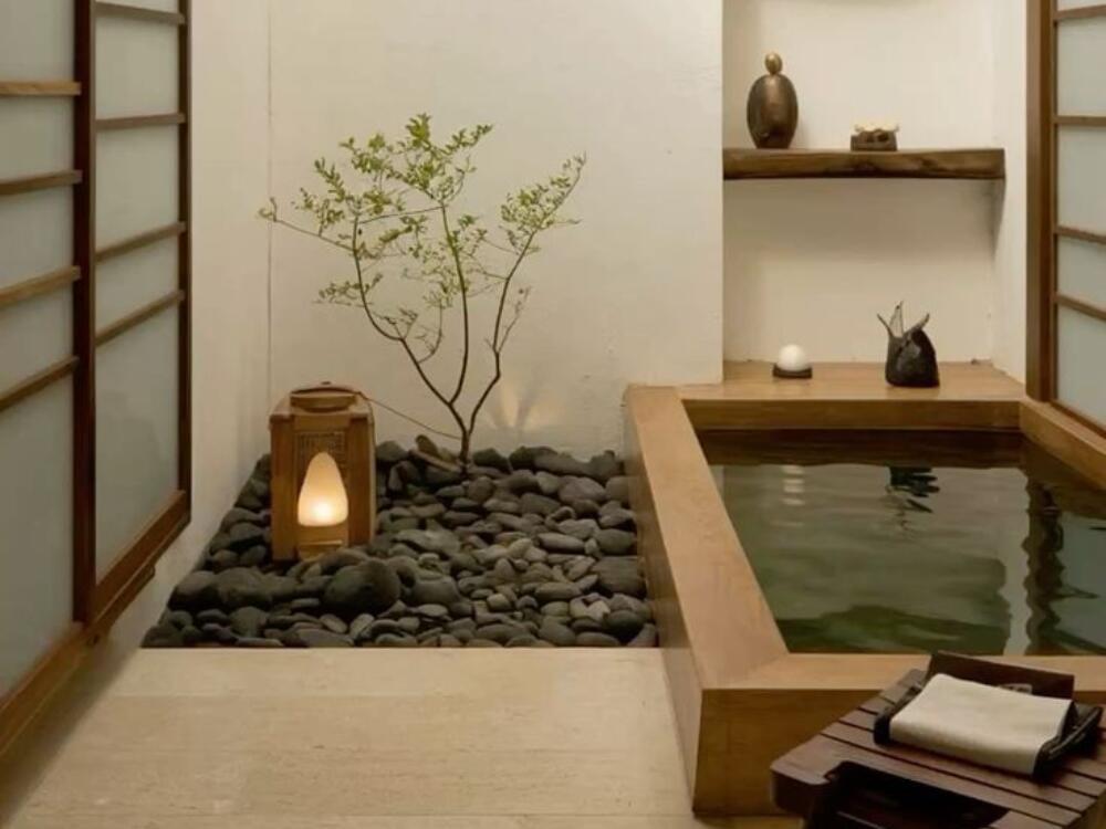 Không gian decor nhẹ nhàng với vật liệu tự nhiên như giấy gạo và chậu cây đá cuội