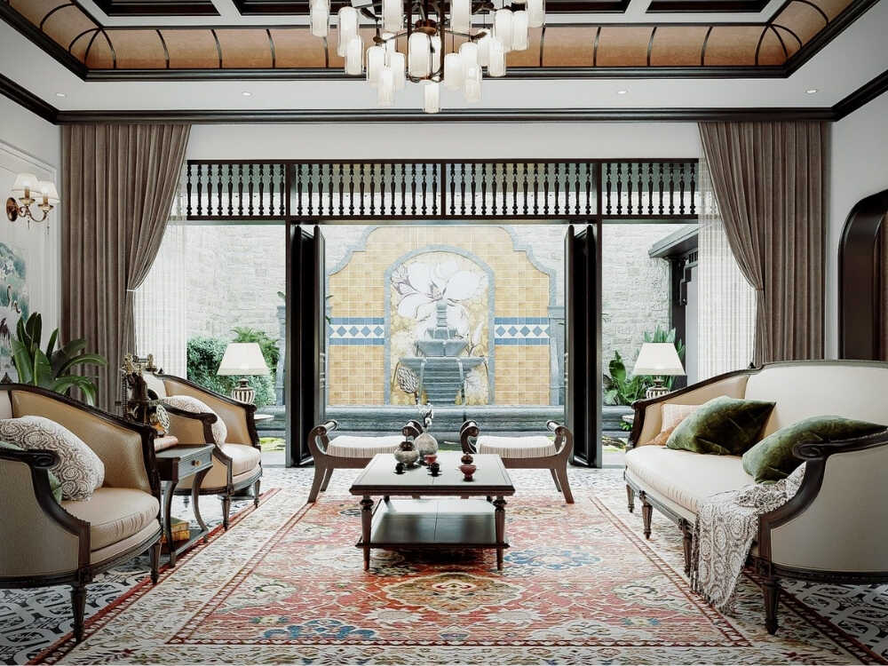 Không gian tiếp khách ấm cúng với gạch bông và bàn trà gỗ chạm khắc tinh tế