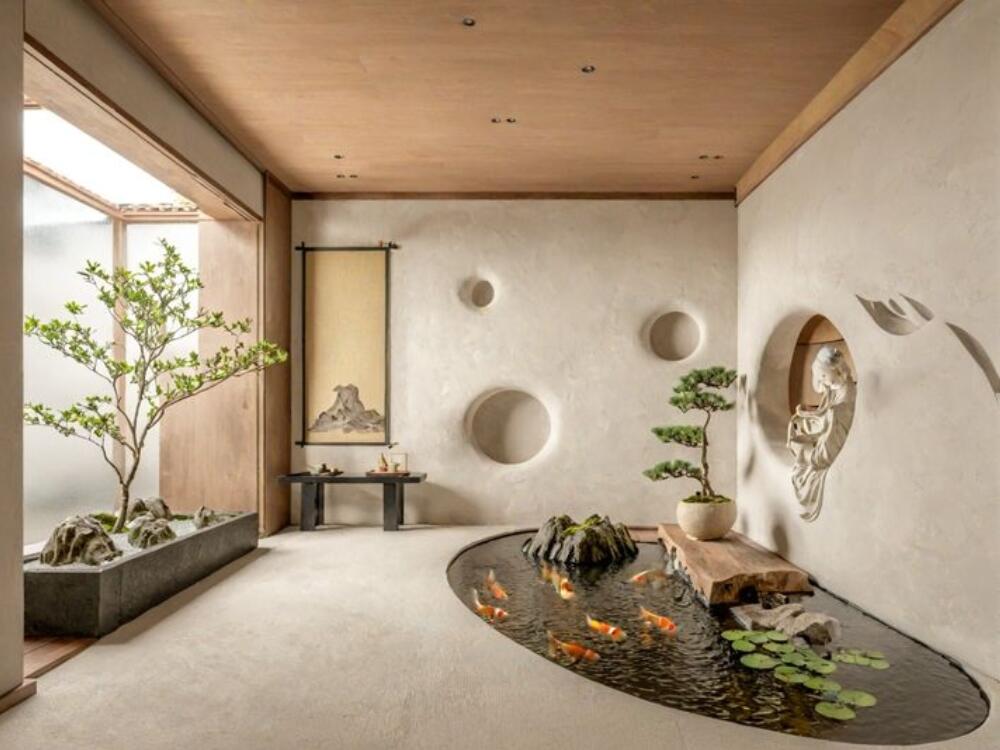 Khu tiểu cảnh Zen tinh giản với cây bonsai và đá cuội tạo điểm nhấn nhẹ nhàng thanh tĩnh