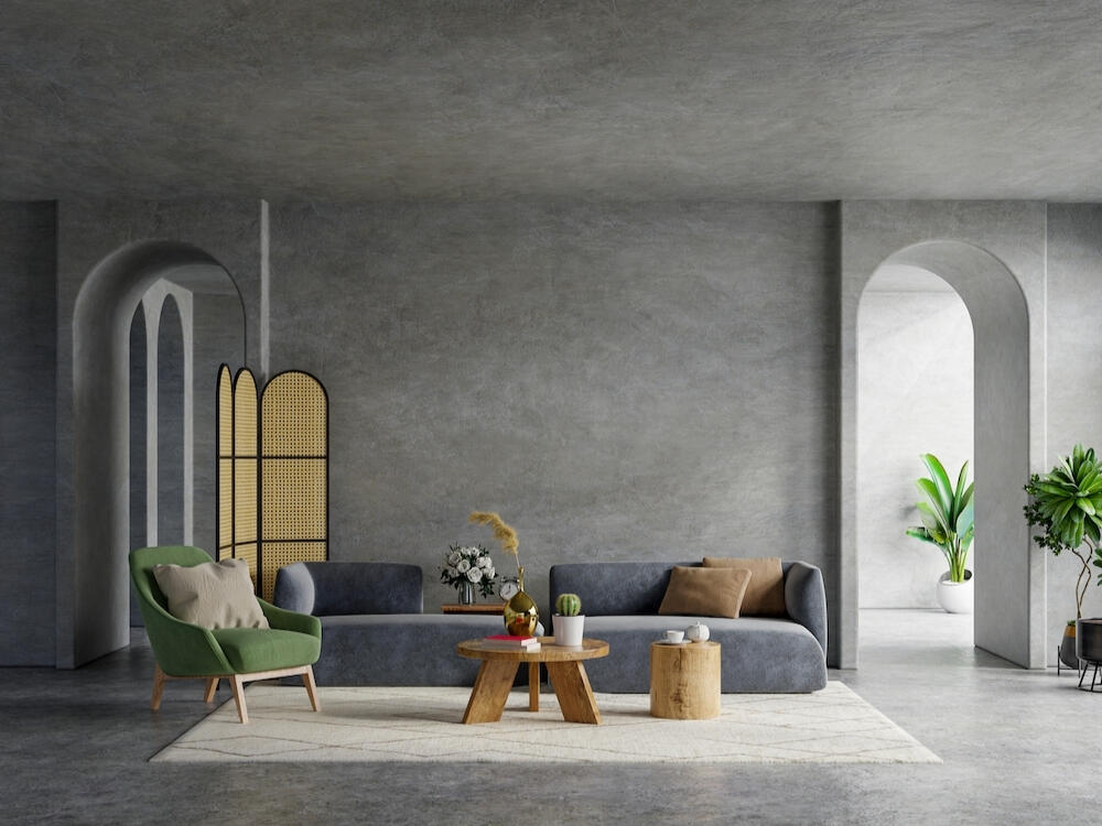 Phòng khách Brutalism sang trọng với tường bê tông trần và sofa da tạo vẻ mạnh mẽ tinh tế