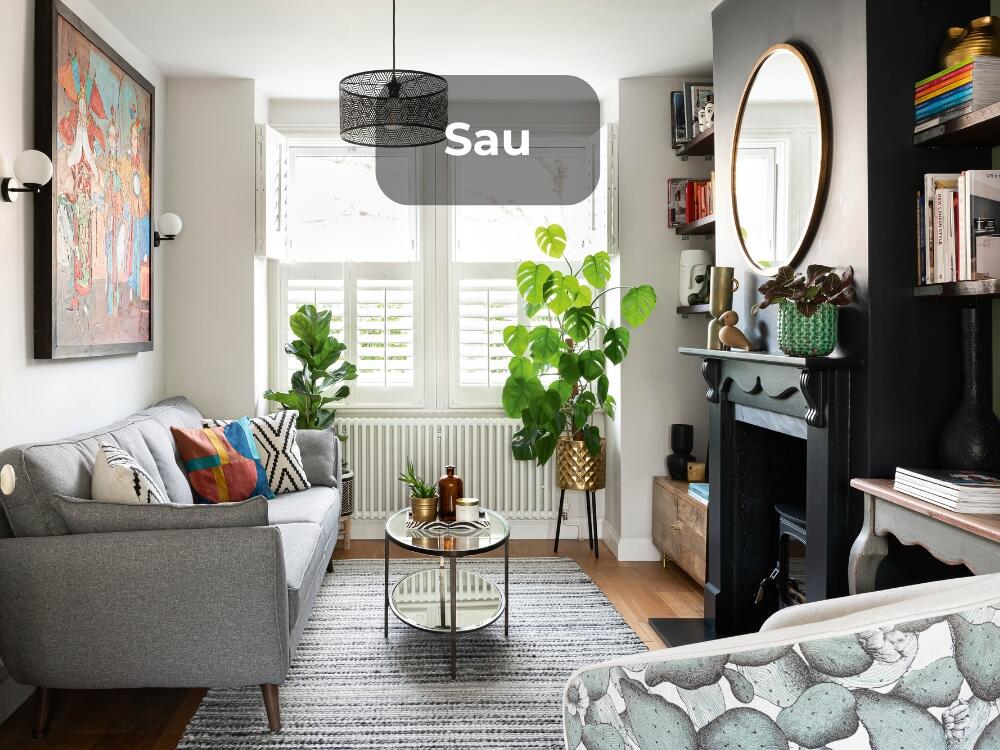 Phòng khách sinh động với tiểu cảnh và cây xanh mang lại cảm giác thư thái trong nhà