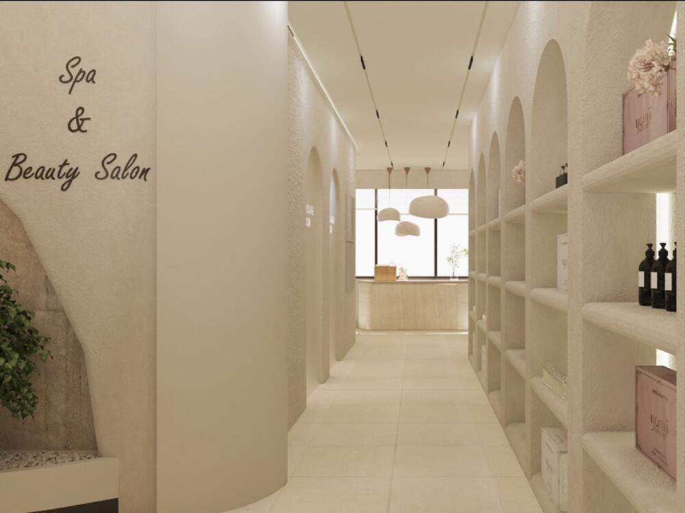 Showroom spa thư giãn với tông kem trắng gỗ nhạt và ánh sáng dịu nhẹ phân khu tư vấn và trưng bày