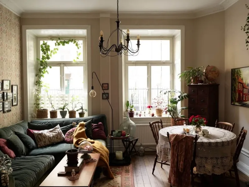 Thiết kế nội thất phòng khách chung cư tân cổ điển hoài cổ có sofa xanh rêu
