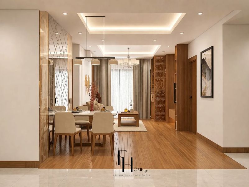 Góc nhìn tổng thể phòng khách phòng ăn vách gương kẻ ô vàng đồng và vách lam gỗ chạm khắc trong thiết kế nội thất căn hộ 90m2 3 phòng ngủ