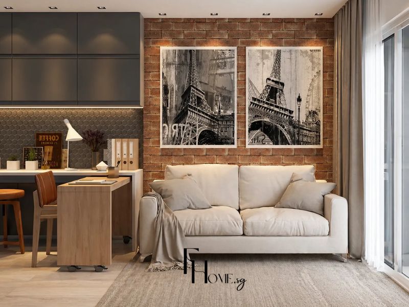Phòng khách chung cư bộ tranh đôi đen trắng tường gạch đỏ ghế sofa kem góc làm việc tích hợp