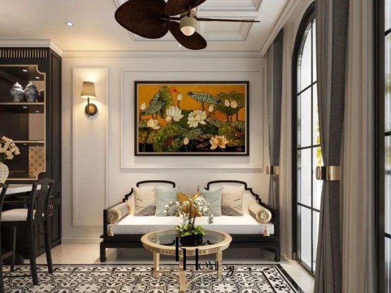 Phòng khách chung cư Indochine ghế trường kỷ gỗ đen tranh sơn mài hoa sen quạt cánh lá cọ sàn gạch bông đen trắng