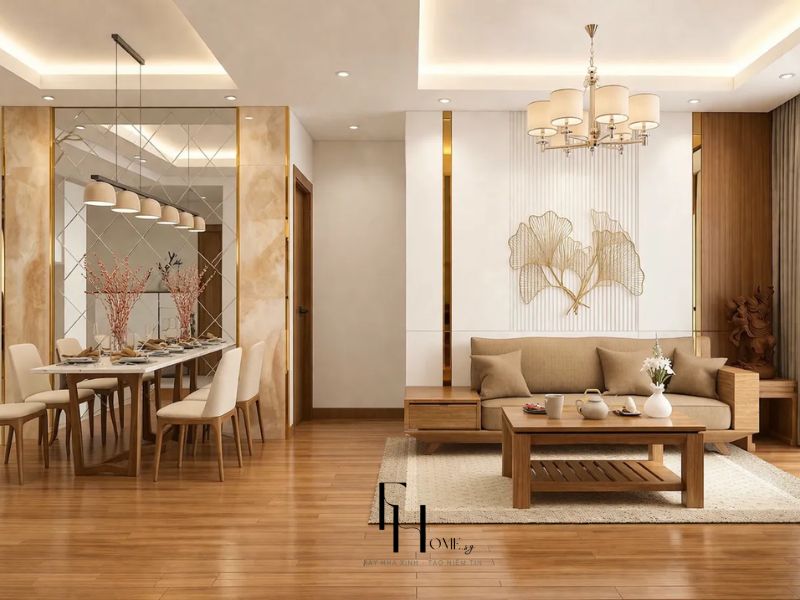 Phòng khách phòng ăn liên thông tông gỗ nâu ấm vách gương vàng đồng và đèn chùm trong thiết kế nội thất chung cư 90m2 3 phòng ngủ