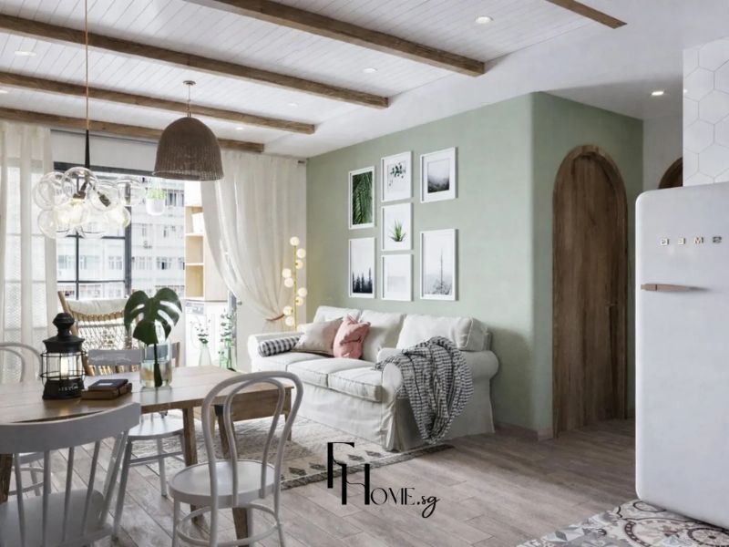 Góc nhìn tổng thể phòng khách với tường gạch thô, xà gồ gỗ và tủ lạnh trắng kiểu cổ điển