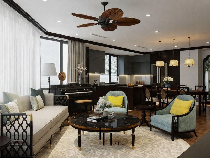 Phòng khách 70m2 phong cách Indochine sofa kem, ghế nhung xanh teal, quạt trần cánh gỗ palm