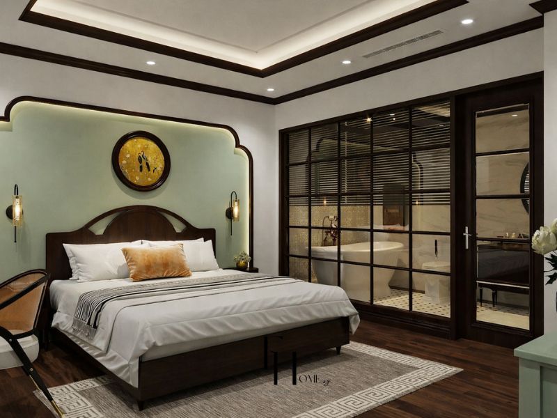 Phòng ngủ 70m2 phong cách Indochine đầu giường cung nhọn xanh mint, vách kính gỗ, bồn tắm đứng chân cao