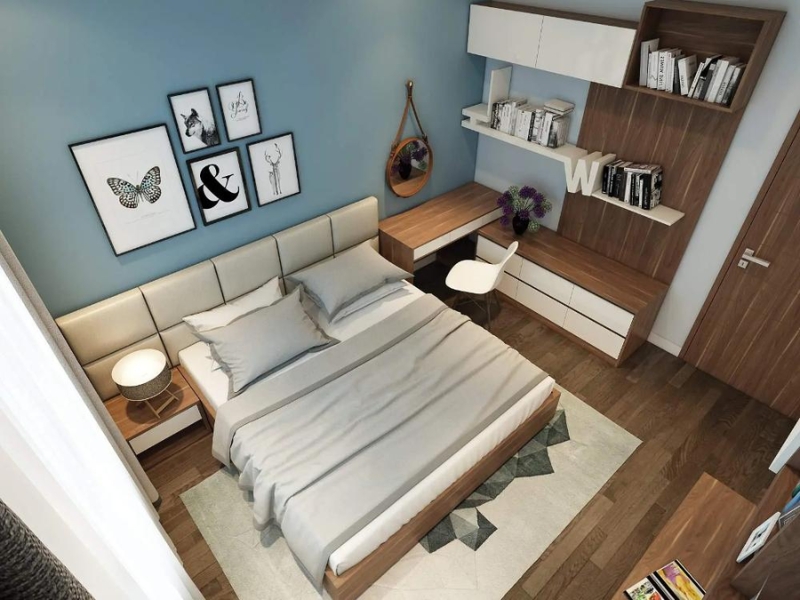 Thiết kế phòng ngủ chung cư 14m² có giường đôi và bàn làm việc kết hợp kệ sách