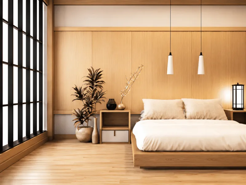 Phòng ngủ kiểu Nhật trang trí cây xanh và bộ bình gốm cạnh giường