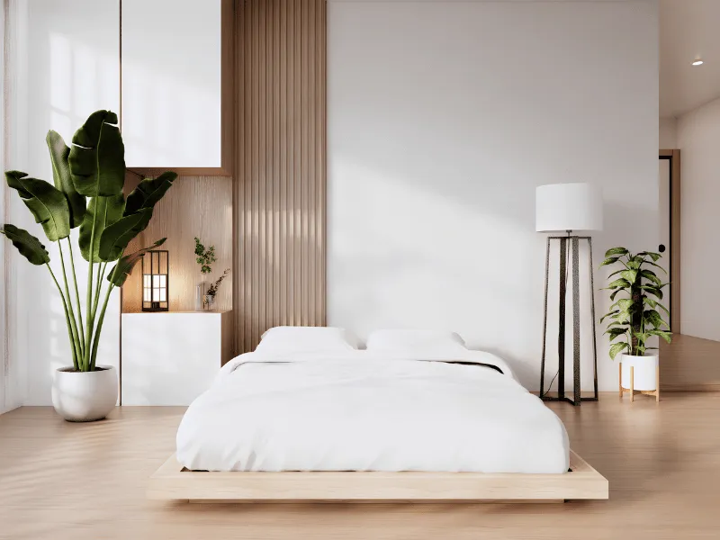 Phòng ngủ kiểu Nhật truyền thống với giường bệt và cây xanh