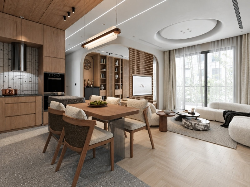 Không gian bếp liền phòng khách căn hộ Japandi với hệ tủ gỗ vách lam mắt cáo và sofa nỉ trắng