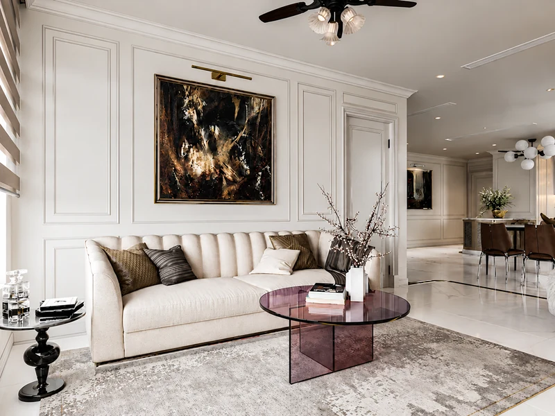 Phòng khách tân cổ điển với sofa trắng tranh trừu tượng lớn bàn trà kính tím và quạt trần.