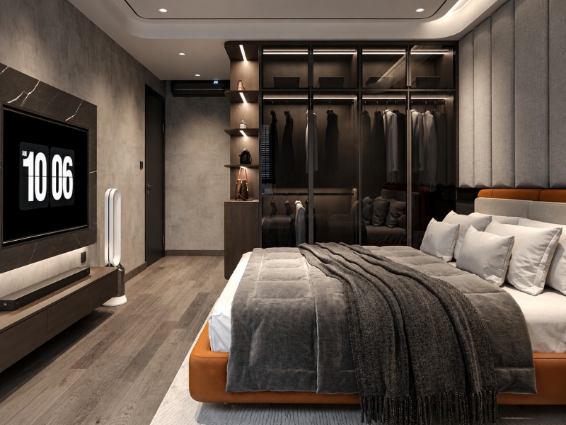  Phòng ngủ chính căn hộ hiện đại với giường bọc da, tủ quần áo cửa kính và kệ tivi. Phòng ngủ chính căn hộ hiện đại với giường bọc da, tủ quần áo cửa kính và kệ tivi. 