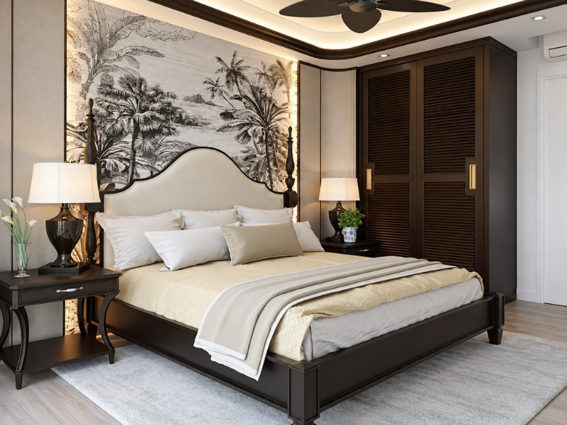 Phòng ngủ Indochine với giường gỗ tối màu và tranh tường họa tiết nhiệt đới