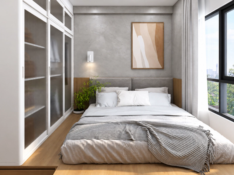 Phòng ngủ chung cư 75m2 với tủ kính và cửa sổ lớn cạnh giường