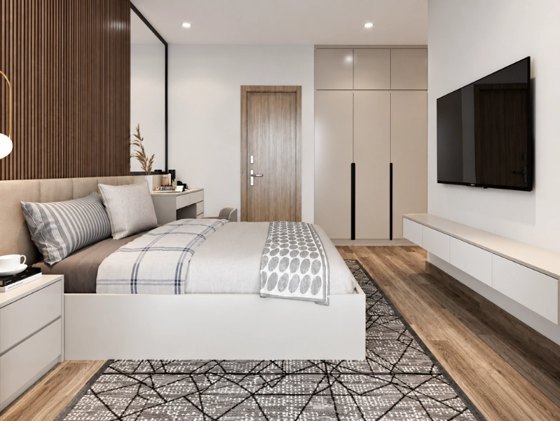 Phòng ngủ chung cư 90m2 có tivi treo cùng tủ trắng và vách nan gỗ