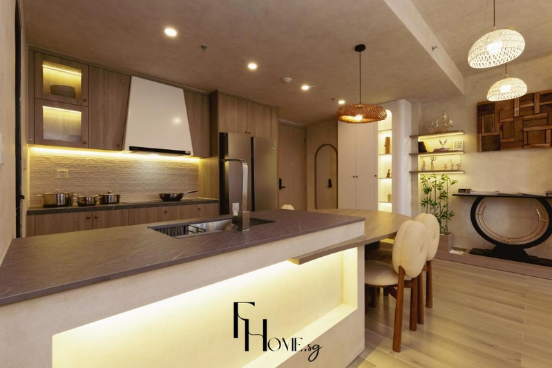 Đảo bếp đặt chậu rửa hướng ra khu bàn ăn và phòng khách