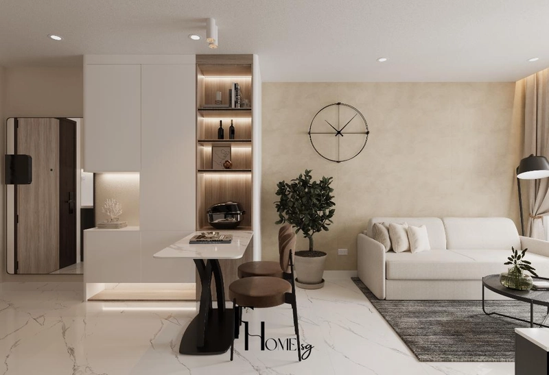 Bàn ăn nhỏ với ghế bọc nâu đặt cạnh tủ trắng và kệ gỗ
