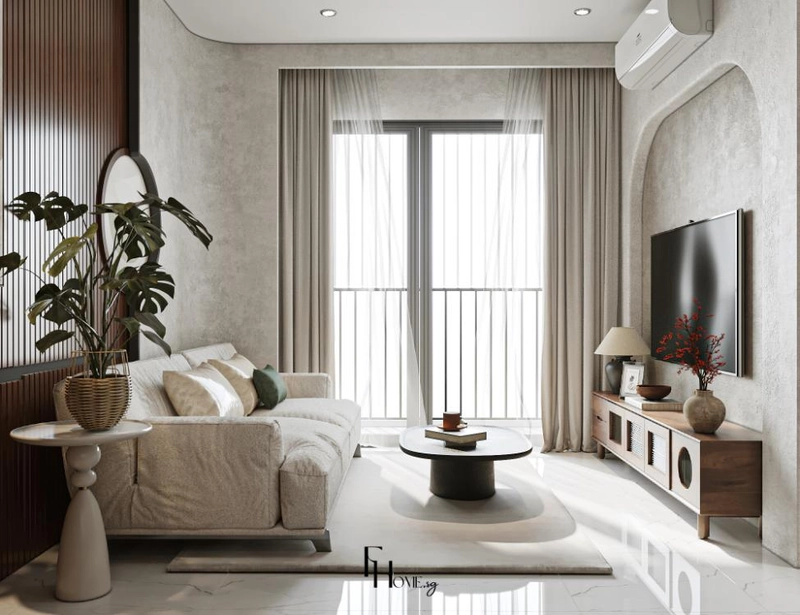 Phòng khách có sofa kem trước tường giả bê tông và khung vòm đặt tivi