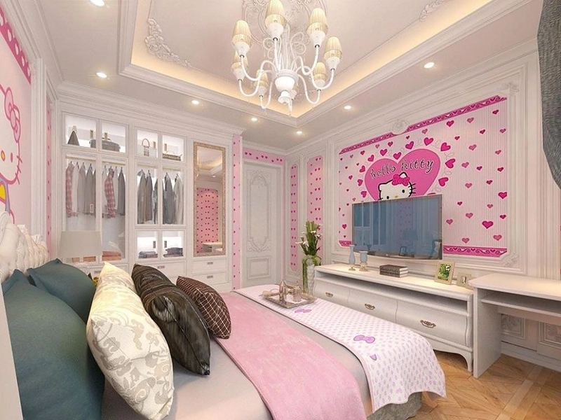 Phòng ngủ bé gái chủ đề Hello Kitty với gam màu hồng trắng chủ đạo, trang trí tường bằng hình nhân vật đáng yêu