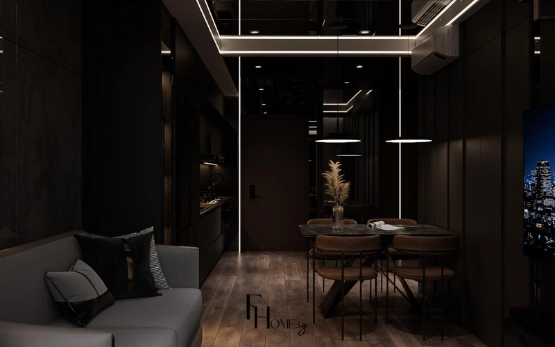 Sofa xám và bàn ăn ghế nâu nối liền trong căn hộ tông màu tối