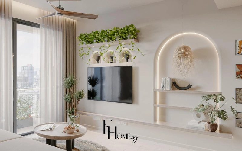 Phòng khách có vách tivi kệ cây xanh và hốc vòm treo đèn thả mây